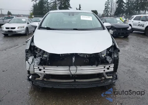 2021 Toyota Prius Le from USA, damaged, VIN JTDKAMFU4M3134389